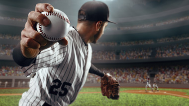 pitcher about to throw ball